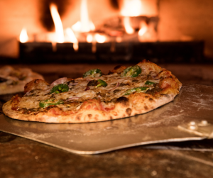 Baked Pizza on Pizza Peel in Oven | Alexandria, VA