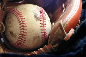 softball in a glove
